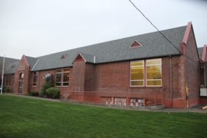 Window & Wood Restoration for Lincoln City Cultural Center Before